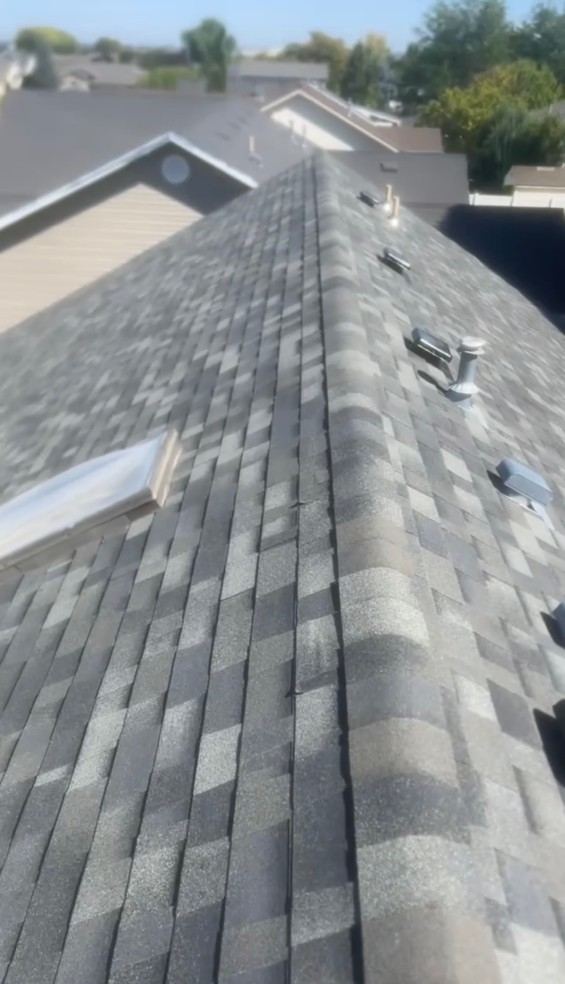 Fresh shingle roof with new vents and flashing installed